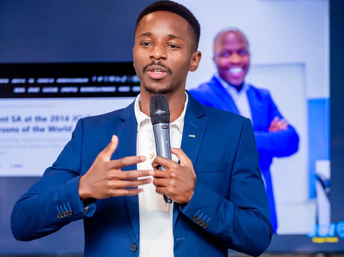 A young leader presenting on stage